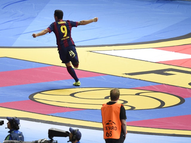 Barcelona's Uruguayan forward Luis Suarez celebrates after scoring the 1-2 during the UEFA Champions League Final football match between Juventus and FC Barcelona at the Olympic Stadium in Berlin on June 6, 2015