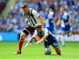 Carl Magnay of Grimsby Town challenges Matt Taylor of Bristol Rovers during the Vanarama Conference Playoff Final match between Grimsby Town and Bristol Rovers at Wembley Stadium on May 17, 2015