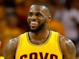 LeBron James #23 of the Cleveland Cavaliers smiles after a play in the first half against the Atlanta Hawks during Game Four of the Eastern Conference Finals of the 2015 NBA Playoffs at Quicken Loans Arena on May 26, 2015