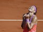 Czech Republic's Lucie Safarova celebrates after winning her match against Serbia's Ana Ivanovic during their women's semi-final match of the Roland Garros 2015 French Tennis Open in Paris on June 4, 2015