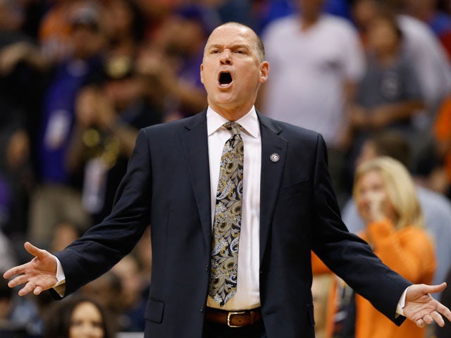 Head coach Michael Malone of the Sacramento Kings reacts during the NBA game against the Phoenix Suns at US Airways Center on November 7, 2014 