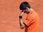 Serbia's Novak Djokovic reacts after a point against Switzerland's Stanislas Wawrinka during their men's final match of the Roland Garros 2015 French Tennis Open in Paris on June 7, 2015