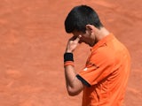 Serbia's Novak Djokovic reacts after a point against Switzerland's Stanislas Wawrinka during their men's final match of the Roland Garros 2015 French Tennis Open in Paris on June 7, 2015