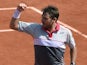 Switzerland's Stanislas Wawrinka reacts after winning the second set against Serbia's Novak Djokovic during their men's final match of the Roland Garros 2015 French Tennis Open in Paris on June 7, 2015