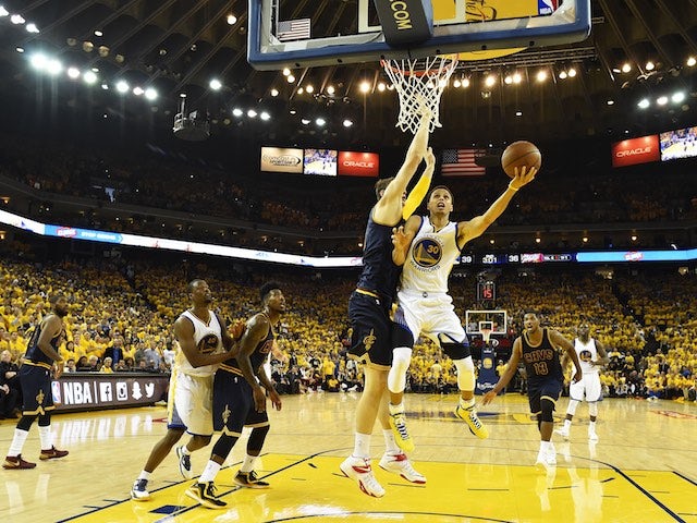 Golden State Warriors point-guard Stephen Curry drives to the basket during game one of the NBA Finals at Oracle Arena on June 4, 2015