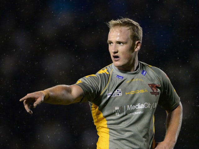 Stuart Howarth of Salford Red Devils in action during the pre season match between Warrington Wolves and Salford Red Devils at Halliwell Jones Stadium on February 5, 2014