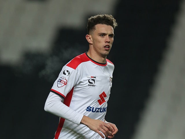 Tom Flanagan of MK Dons in action during the FA Cup Second Round match between MK Dons and Chesterfield at Stadium mk on December 6, 2014