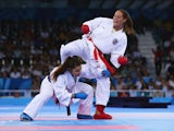 Elena Quirici of Switzerland (blue) competes with Alisa Theresa Buchinger of Austria (red) in the Women's Karate Kumite -68kg semi finals during day two of the Baku 2015 European Games at Crystal Hall on June 14, 2015 