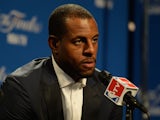 Andre Iguodala #9 of the Golden State Warriors spwaks in overtime the media after Game Four of the 2015 NBA Finals against the Cleveland Cavaliers at Quicken Loans Arena on June 11, 2015