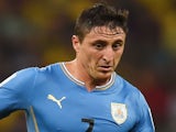 Cristian Rodriguez of Uruguay controls the ball during the 2014 FIFA World Cup Brazil round of 16 match between Colombia and Uruguay at Maracana on June 28, 2014