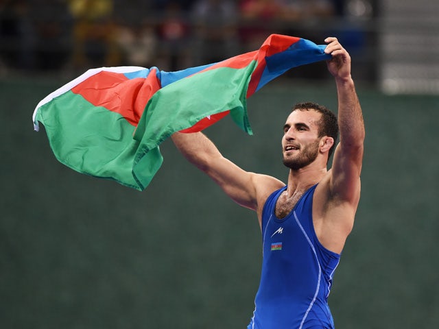 Elvin Mursaliyev of Azerbaijan celebrates victory over Viktor Nemes of Serbia during the Men's Wrestling 75kg Greco Roman final during day two of the Baku 2015 European Games at Heydar Aliyev Arena on June 14, 2015