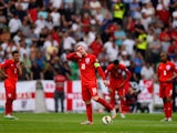 Captain Wayne Rooney of England prepares to restart after conceding the first goal during the UEFA EURO 2016 Qualifier between Slovenia and England on at the Stozice Arena on June 14, 2015
