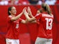 Fabienne Humm #16 and Ana-Maria Crnogorcevic #13 of Switzerland celebrate Switzerland's second goal during the FIFA Women's World Cup Canada 2015 Group C match between Switzerland and Ecuador June 12, 2015