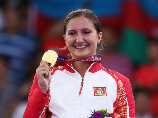 Gold medalist Irina Zaretska of Azerbaijan celebrates during the medal ceremony for Women's Karate Kumite -68kg on day two of the Baku 2015 European Games at Crystal Hall on June 14, 2015