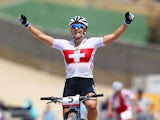 Kathrin Stirnemann of Switzerland celebrates as she crosses the line to win silver in the Women's Cross-country Mountain Bike Cycling during day one of the Baku 2015 European Games at Mountain Bike Velopark on June 13, 2015