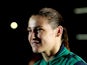 Gold medalist Katie Taylor of Ireland walks to the medal ceremony for the Women's Light (60kg) Boxing final bout on Day 13 of the London 2012 Olympic Games at ExCeL on August 9, 2012