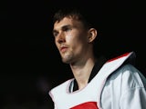 Stamper of Great Britain walks out to compete against Damir Fejzic of Serbia during the Men's -68kg Taekwondo quarterfinal match on Day 13 of the London 2012 Olympic Games at ExCeL on August 9, 2012 