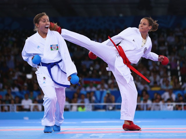Irina Zaretska of Azerbaijan (blue) competes with Masa Martinovic of Croatia (red) in the Women's Karate Kumite +68kg gold medal match during day two of the Baku 2015 European Games at Crystal Hall on June 14, 2015