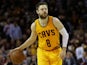 Matthew Dellavedova #8 of the Cleveland Cavaliers controls the ball against the Golden State Warriors during Game Three of the 2015 NBA Finals at Quicken Loans Arena on June 9, 2015