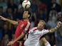 Spain's midfielder Sergio Busquets (L) vies for the ball with Belarus' midfielder Pavel Nekhaychik during the Euro 2016 group C qualifying football match between Belarus and Spain in Borisov, outside Minsk, on June 14, 2015