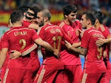 Spain's players celebrate a goal during the friendly football match Spain vs Costa Rica at the Reino de Leon stadium in Leon on June 11, 2015