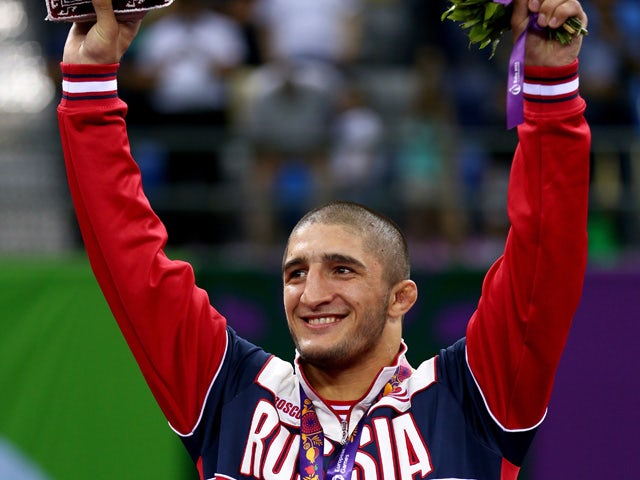 Gold medalist Abdulrashid Sadulaev of Russia stands on the podium during the medal ceremony for the Men's Wrestling 86kg freestyle on day six of the Baku 2015 European Games at the Heydar Aliyev Arena on June 18, 2015