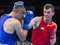 Ireland's Adam Nolan (red) fights with Albania's Alban Beqiri during the mens welter (69kg) round of 32 boxing fight at the 2015 European Games in Baku on June 17, 2015