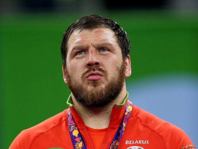 Silver medalist Aleksei Shemarov of Belarus stands on the podium during the medal ceremony for the Men's Wrestling 125kg freestyle on day six of the Baku 2015 European Games at the Heydar Aliyev Arena on June 18, 2015