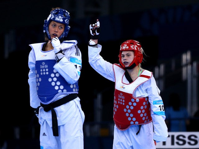 Charlie Maddock of Team GB celebrates after beating Italy's Erica Nicoli to qualify for the semi-finals of the women's -49kg taekwondo at the European Games in Baku