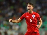 Gary Cahill of England celebrates after Jack Wilshere of England scored their first goal during the UEFA EURO 2016 Qualifier between Slovenia and England on at the Stozice Arena on June 14, 2015