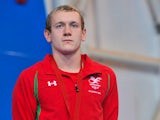 Jack Thomas poses on the podium Men's 200m Freestyle S14 Medal Ceremony at the Tollcross International Swimming Centre during the 2014 Commonwealth Games in Glasgow on July 26, 2014