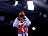 Team GB's Jade Jones removes her helmet following her victory in the preliminary rounds of the 2015 European Games in Baku