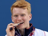 James Heatly poses with his medal after winning diving gold for Team GB at the European Games on June 18, 2015