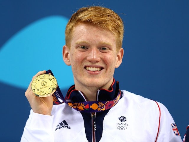 Team GB diver James Heatly poses with his gold medal at the European Games on June 20, 2015