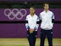 Great Britain's Laura Robson (L) and Andy Murray wait to receive their silver medals during a ceremony at the end of the London 2012 Olympic Games mixed doubles tennis tournament, at the All England Tennis Club in Wimbledon, southwest London, on August 5,