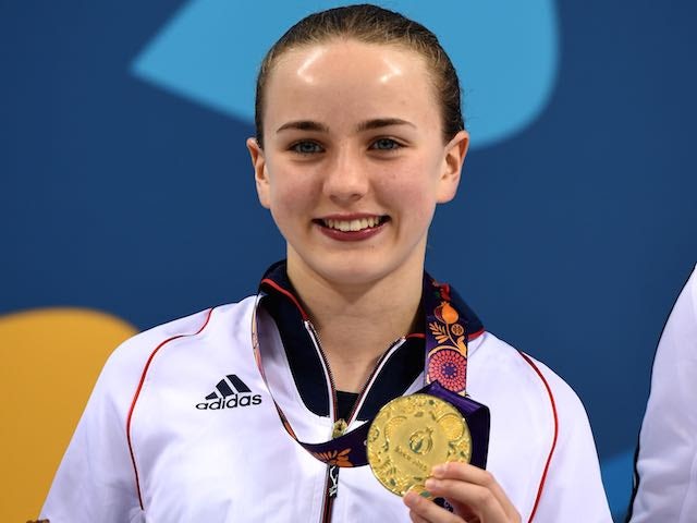Team GB's Lois Toulson clutches her gold medal after winning gold in the women's 10m at the European Games on June 18, 2015