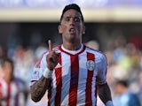 Paraguay's forward Lucas Barrios celebrates after scoring against Uruguay during their 2015 Copa America football championship match, in La Serena, on June 20, 2015