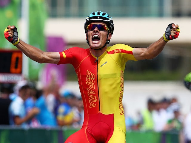 Luis Leon Sanchez Gil of Spain celebrates as he crosses the line to win gold during the Men's Cycling Road Race on day nine of the Baku 2015 European Games at Freedom Square on June 21, 2015