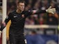 Roma's goalkeeper from Poland Lukasz Skorupski reacts during the UEFA Champions League Group E second-leg football match FC Bayern Munich vs AS Roma in Munich, southern Germany, on November 5, 2014