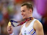 Gold medalist Oleg Verniaiev of Ukraine poses on the podium during the medal ceremony for the the Men's Vault final on day eight of the Baku 2015 European Games at the National Gymnastics Arena on June 20, 2015