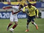 Peru's forward Paolo Guerrero (L) and Colombia's defender Jeison Murillo vie for the ball during their 2015 Copa America football championship match, in Temuco, Chile, on June 21, 2015