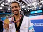 Rui Braganca of Portugal poses with his gold medal after winning the Men's Taekwondo -58kg final during day four of the Baku 2015 European Games at Crystal Hall on June 16, 2015
