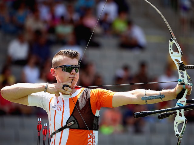 Sjef Van Den Berg competes in the Men's Team Archery quarter finals against Russia during day six of the Baku 2015 European Games at Tofiq Bahramov Stadium on June 18, 2015