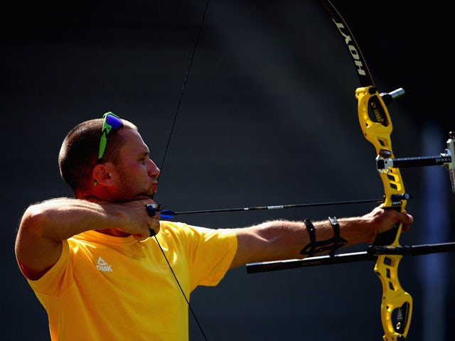Vicktor Ruban of Ukraine competes in the Men's Team Archery finals against Spain during day six of the Baku 2015 European Games at Tofiq Bahramov Stadium on June 18, 2015