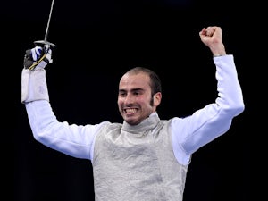 Alessio Foconi of Italy celebrates victory over Timur Arslanov of Russia in the Men's Fencing Individual Foil Final during day thirteen of the Baku 2015 European Games at the Crystal Hall on June 25, 2015