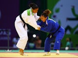 Andreea Chitu of Romania (blue) and Annabelle Euranie of France(white) compete during the Women's Judo -52kg gold medal match on day thirteen of the Baku 2015 European Games at the Heydar Aliyev Arena on June 25, 2015