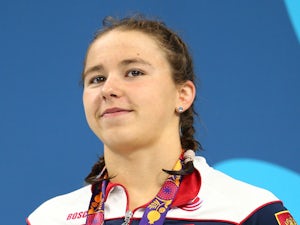 Openysheva wins gold in 400m freestyle