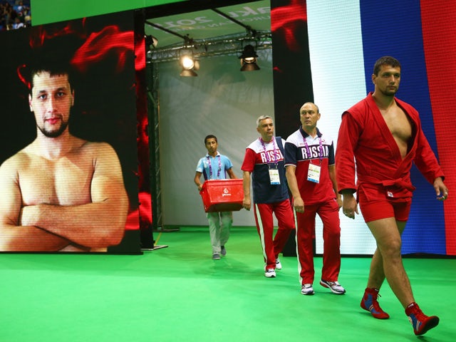 Artem Osipenko of Russia enters the arena prior to the Men's Sambo +100kg gold medal final against Vasif Safarbayov of Azerbaijanon day ten of the Baku 2015 European Games at the Heydar Aliyev Arena on June 22, 2015