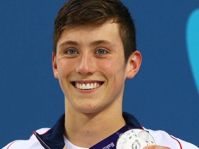 Team GB swimmer Cameron Kurle poses with his silver medal earned during the men's 200m freestyle at the European Games on June 27, 2015