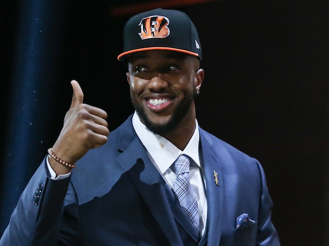 Cedric Ogbuehi of the Texas A&M Aggies walks on stage after being picked #21 overall by the Cincinnati Bengals during the first round of the 2015 NFL Draft at the Auditorium Theatre of Roosevelt University on April 30, 2015 